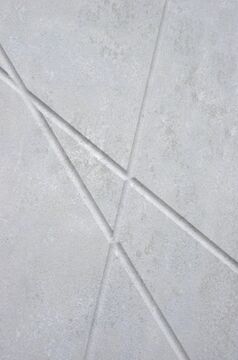 фрагмент узора двери светлого покрытия под бетон